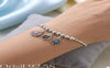 Elegant Silver-Toned Multi-Charm Adjustable Bracelet.