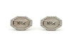 Pair of hexagonal earrings with 'D&G' logo on a white background