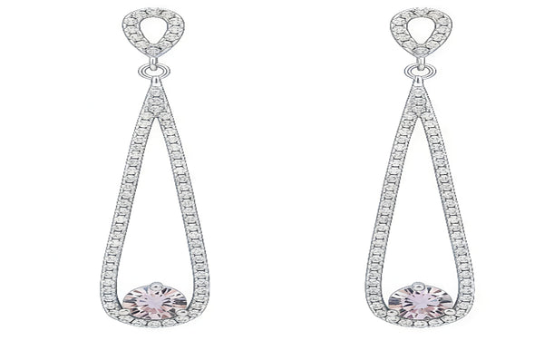 Pair of silver earrings with pink gemstones on a white background