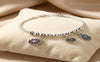 Elegant Silver-Toned Multi-Charm Adjustable Bracelet.