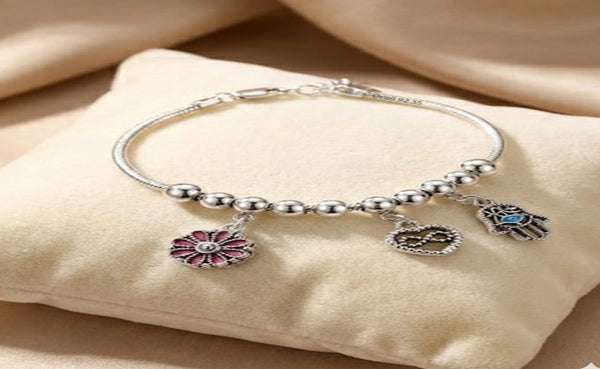 Elegant Silver-Toned Multi-Charm Adjustable Bracelet.