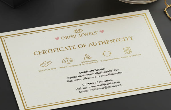 Orisil Jewels certificate of authenticity on a dark surface