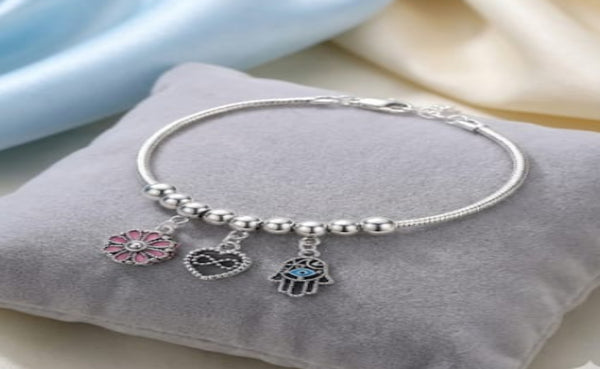 Elegant Silver-Toned Multi-Charm Adjustable Bracelet.
