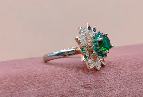 Orisil Jewels: Royal Emerald Bloom Floral Ring Elevate your elegance with our Royal Emerald Bloom Floral Ring.